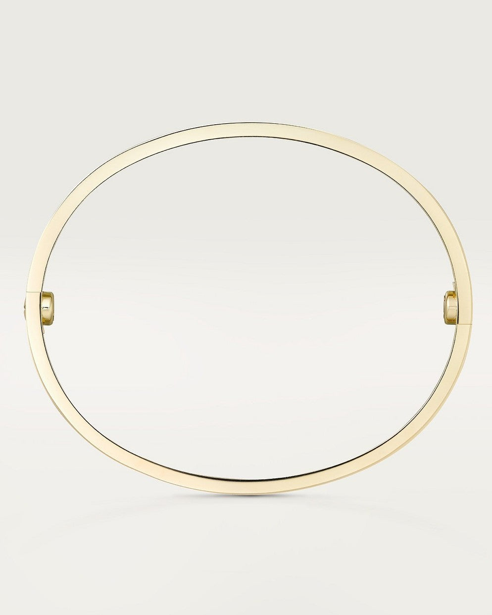 Pulsera rígida dorada minimalista – elegancia discreta y atemporal 